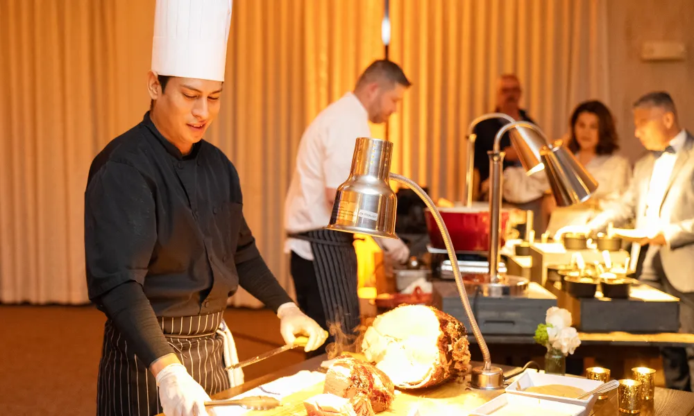 Chef's serving food in Diamond Cocktail Room. 