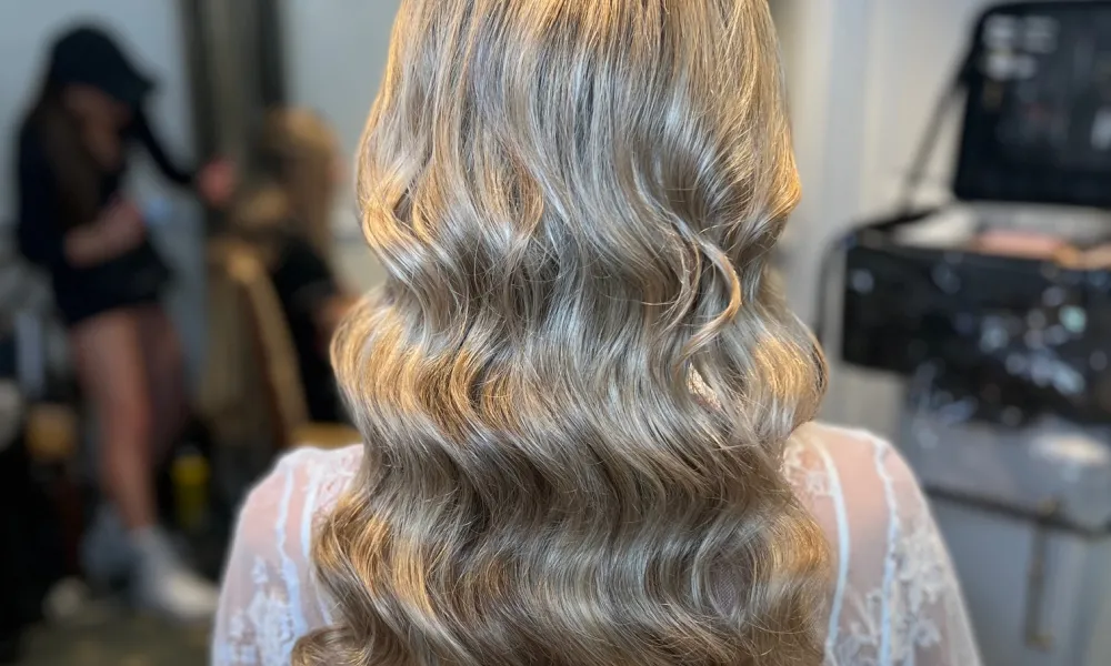 Wavy blonde hair. 