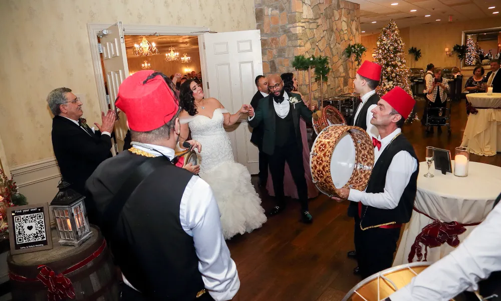 Bride and groom entering Diamond Cocktail Room. 