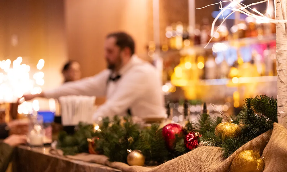 Bartender tending to customers during event in Canyon Ballroom