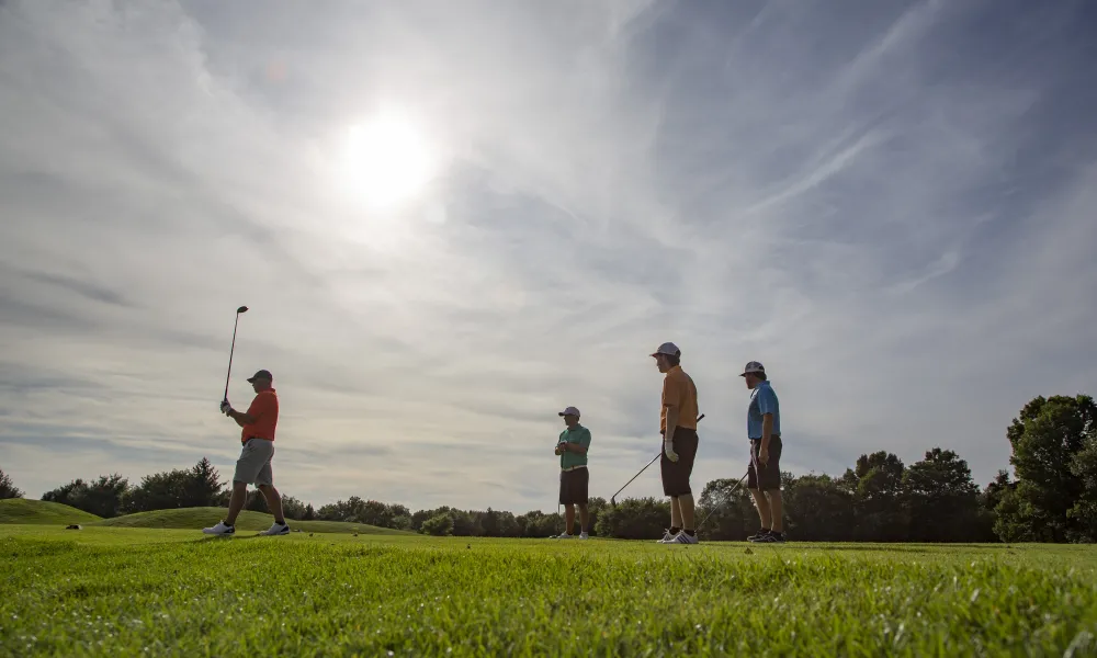 Golfers on a course at Crystal Springs Resort