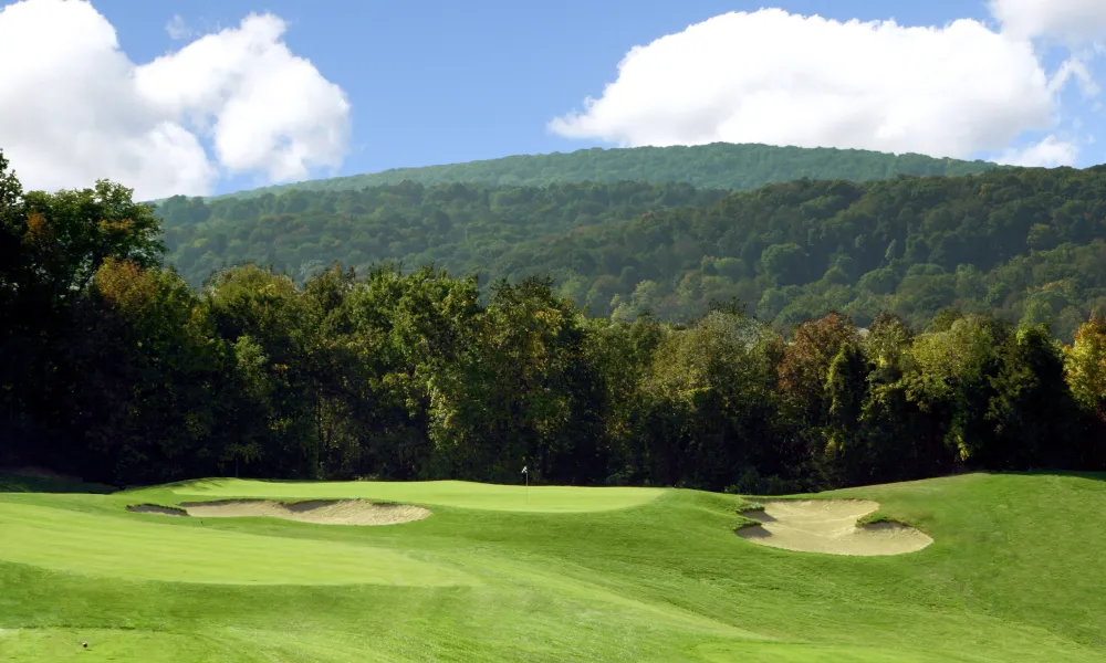 A view of the mountains from the fairway at Minerals Golf Club at Crystal Springs Resort