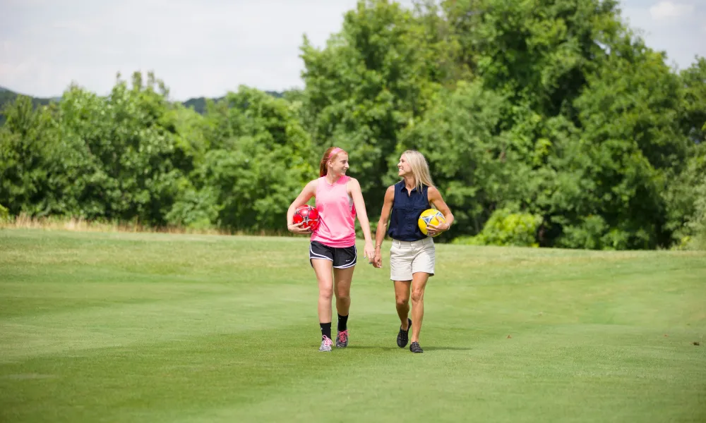 Girlfriends on a weekend getaway ready to play footgolf at Crystal Springs Resort