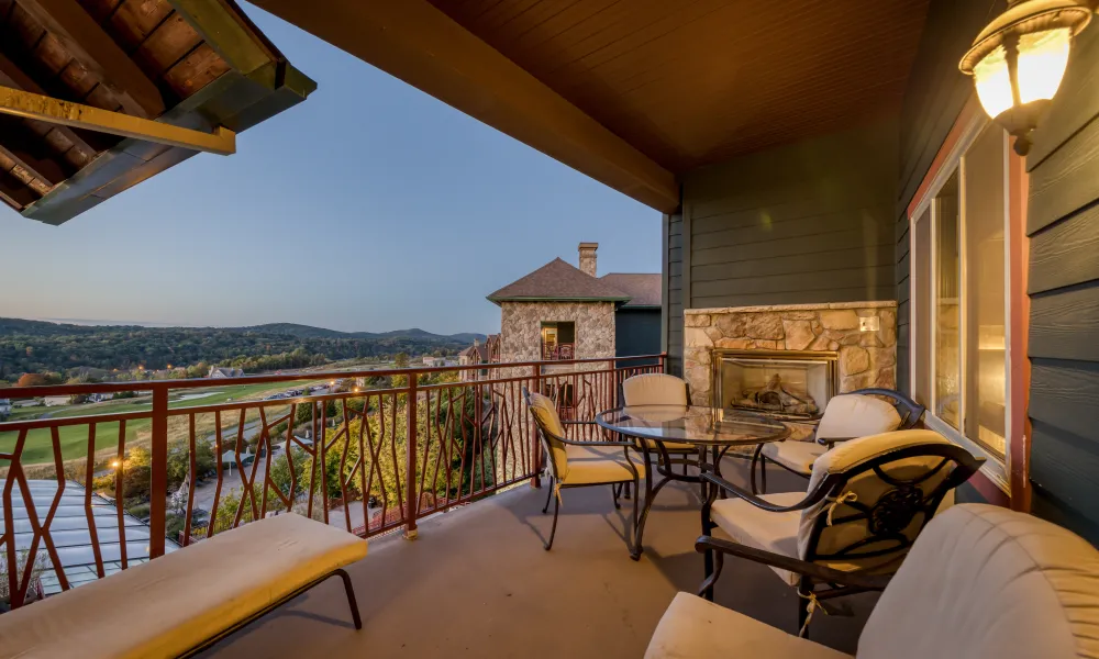 Hotel room balcony overlooking Fire and Water Terrace at Grand Cascades Lodge