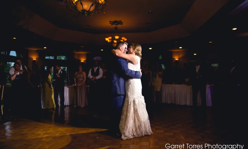 Bride and groom dancing during wedding reception at Black Bear Golf Club