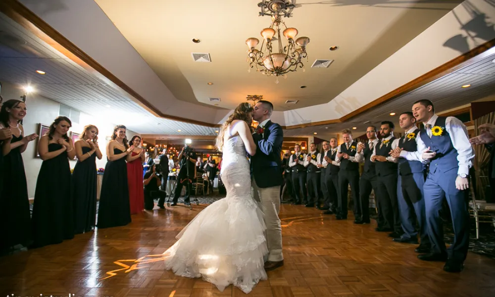 Bride and groom dancing at wedding reception