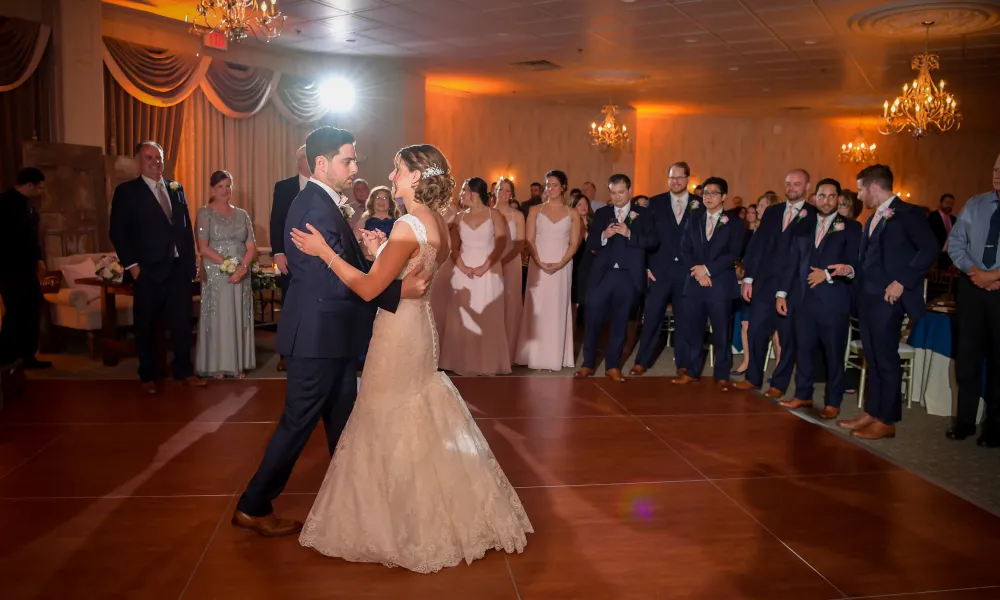 Bride and groom dancing together at wedding