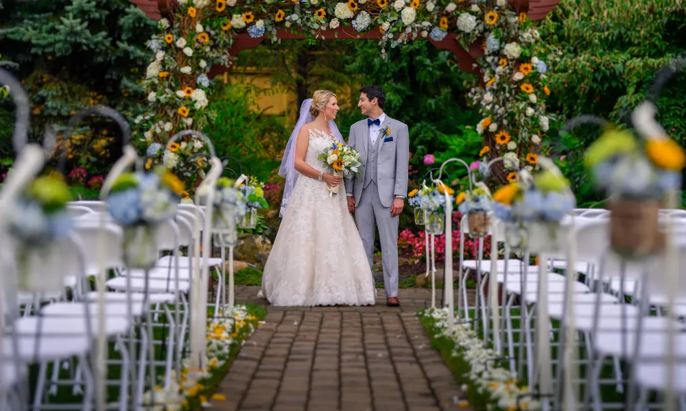 Bride and groom standing at the alter together