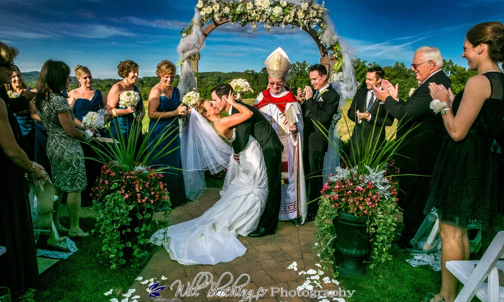 Bride and groom kiss after getting married