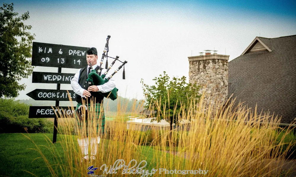 Bagpiper playing at wedding at Ballyowen golf club