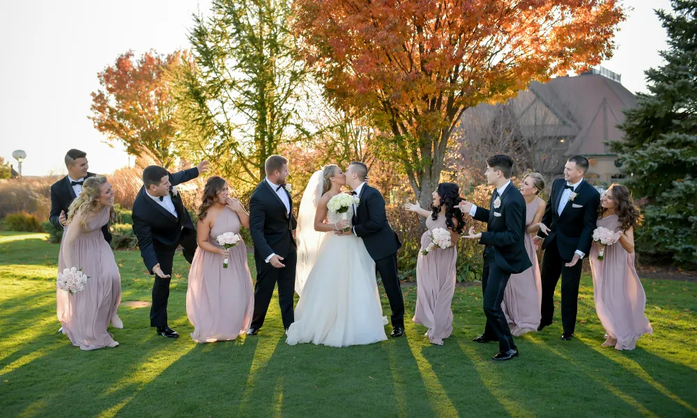 Wedding party outside Grand Cascades Lodge