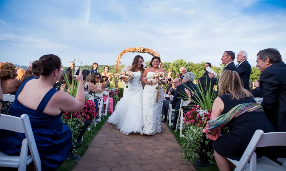 Brides walking down the aisle at Crystal Springs Resort in NJ