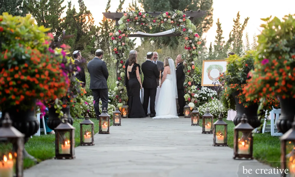 Floral Jewish wedding ceremony