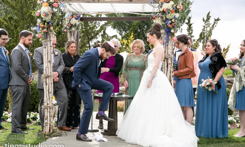 Breaking of the glass at Jewish wedding at Crystal Springs Resort in NJ