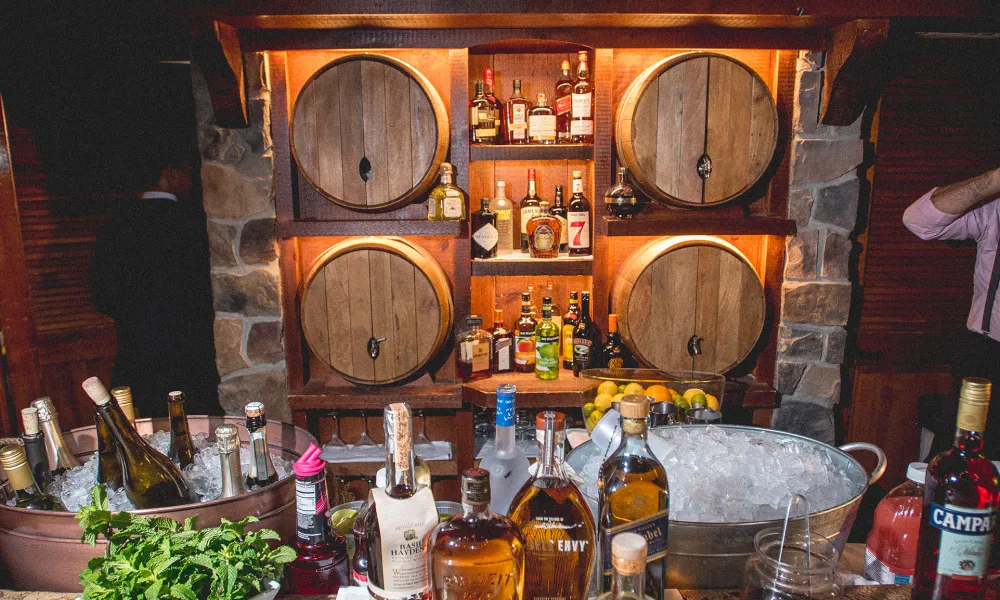 Bar with wooden barrels for kegs.