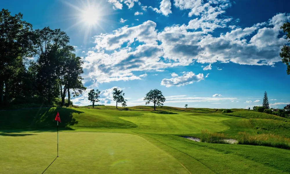 Putting green on a golf course at Crystal Springs Resort