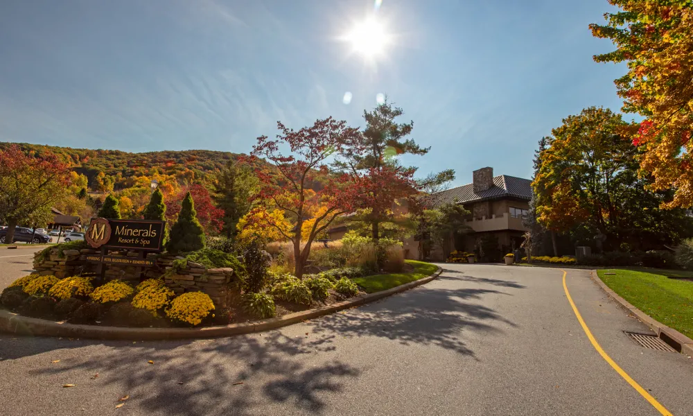 Exterior entrance view of Minerals Hotel during the fall