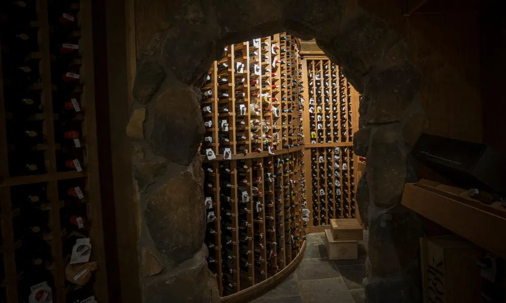 Wine being stored in the walls of the wine cellar. 