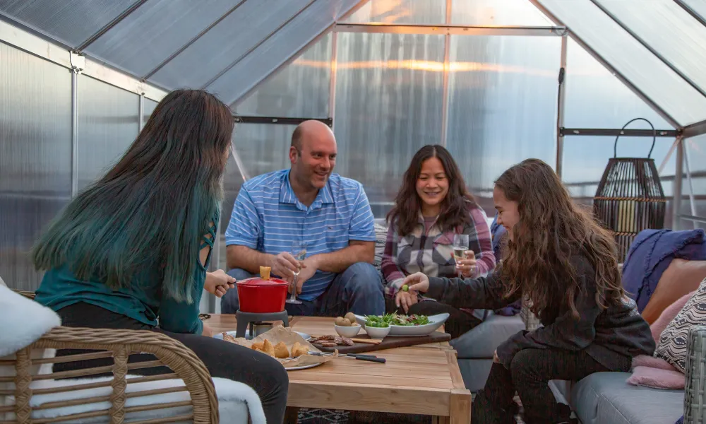 Family of four eating in Champagne Chalet