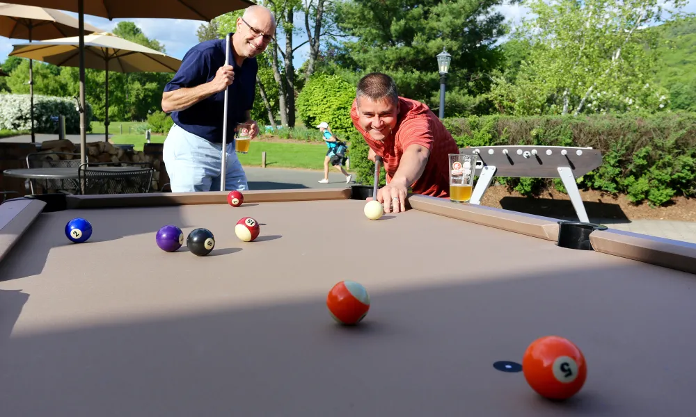 Men playing game of pool