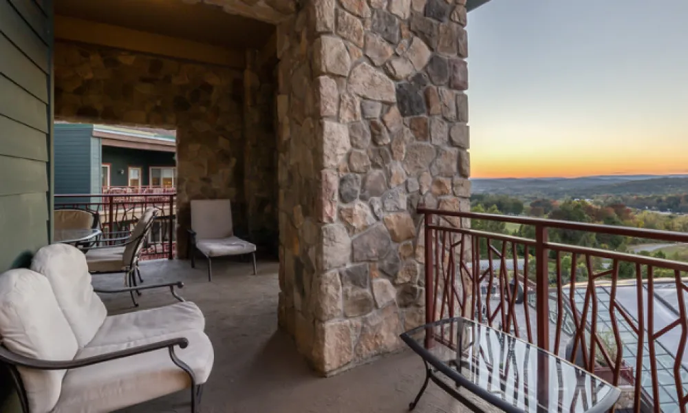 Guest Room Balcony Sunset View at Grand Cascades Lodge in NJ