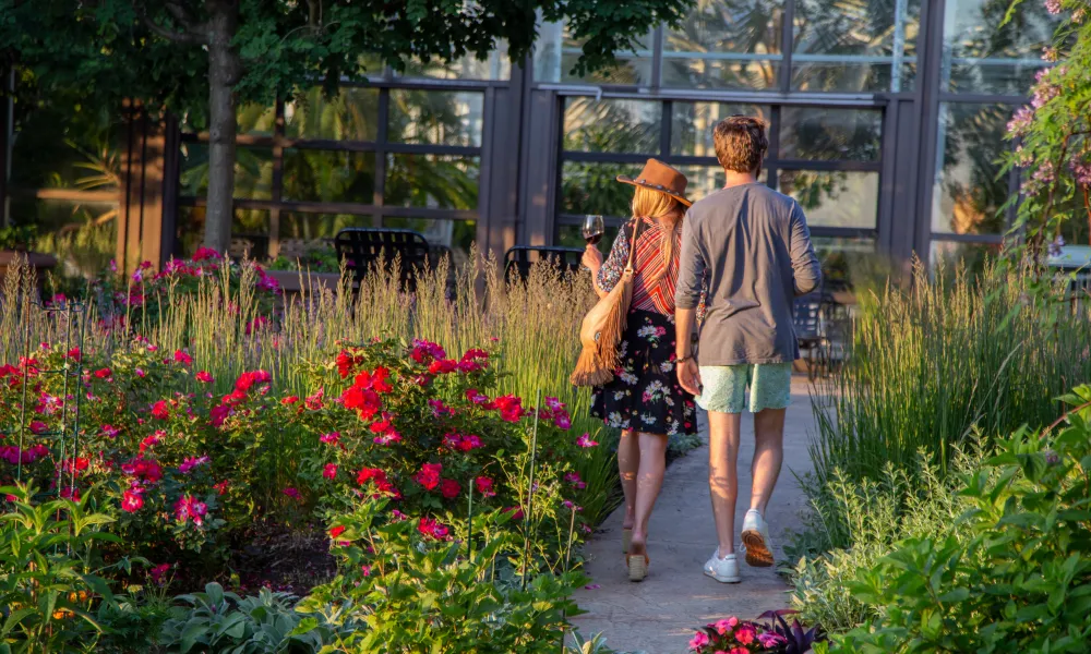 Couple walking through Chef's Garden