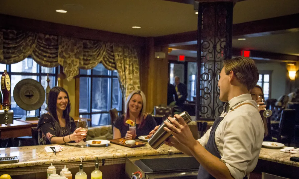 Bartender making cocktails at Springs Bistro