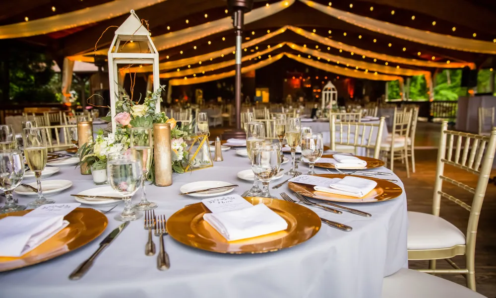 Table set for wedding reception in Sweetgrass Pavillion