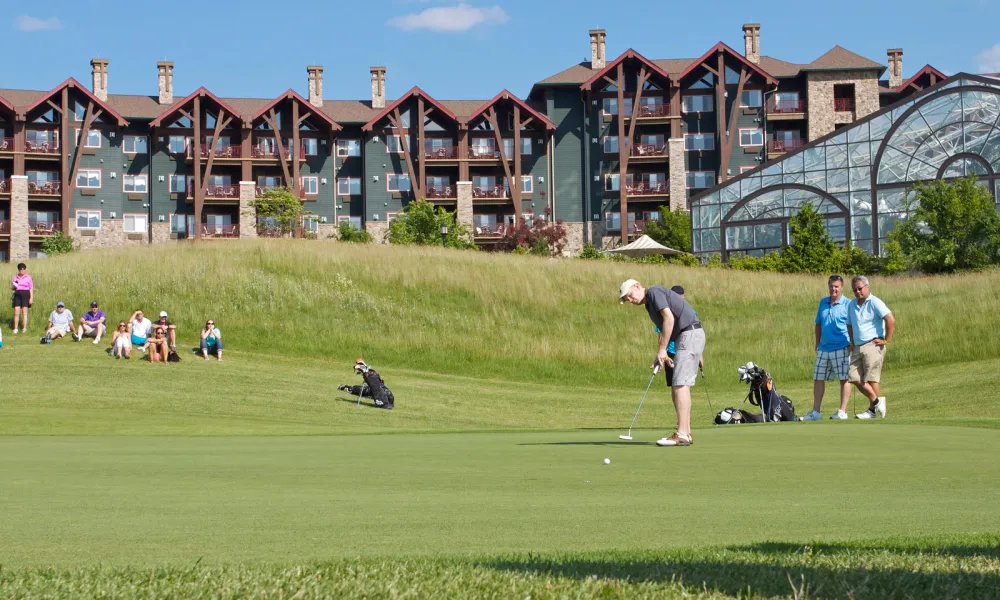 A foursome on the golf course of Cascades at Crystal Springs Resort