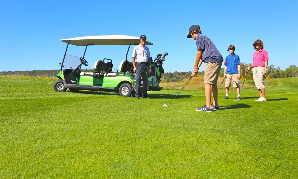 A family golfing at a resort close to New York City