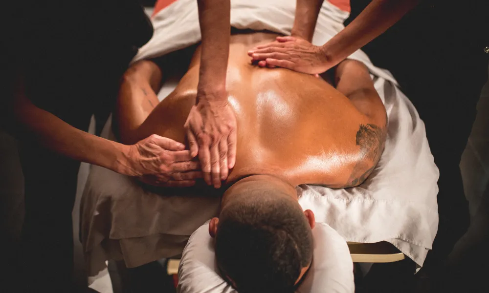 Guest receiving back massage.