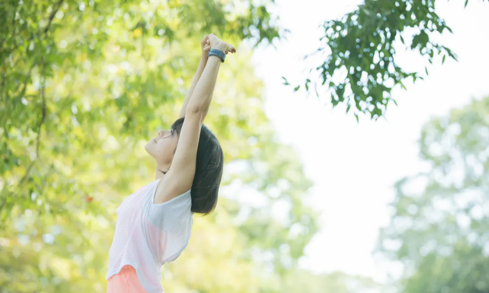 Girl forest bathing at a resort near NYC