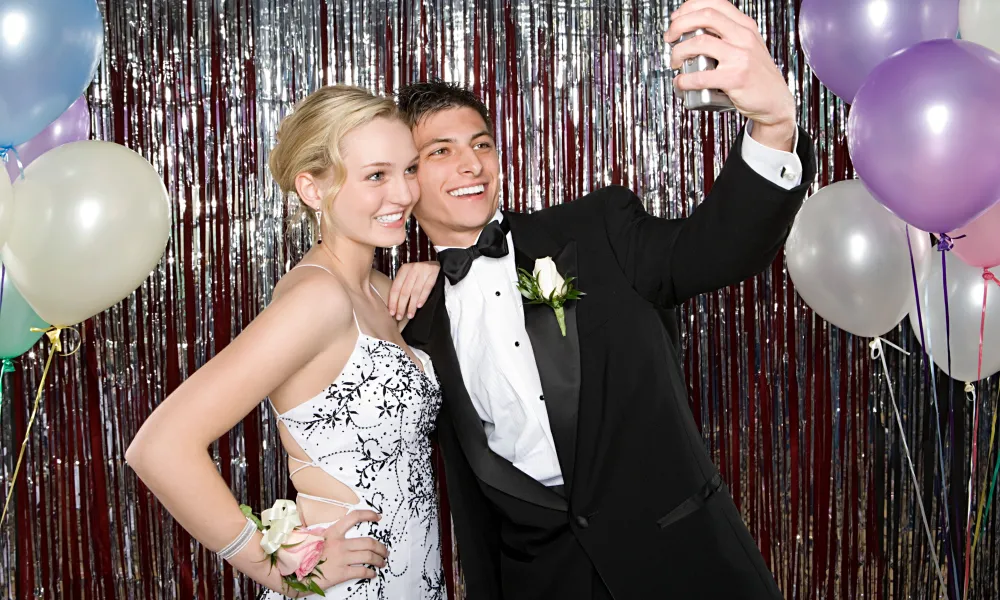 Couple Taking Selfie at Prom