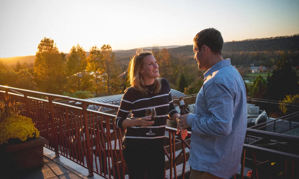 Couple Chatting at the fire and water terrace