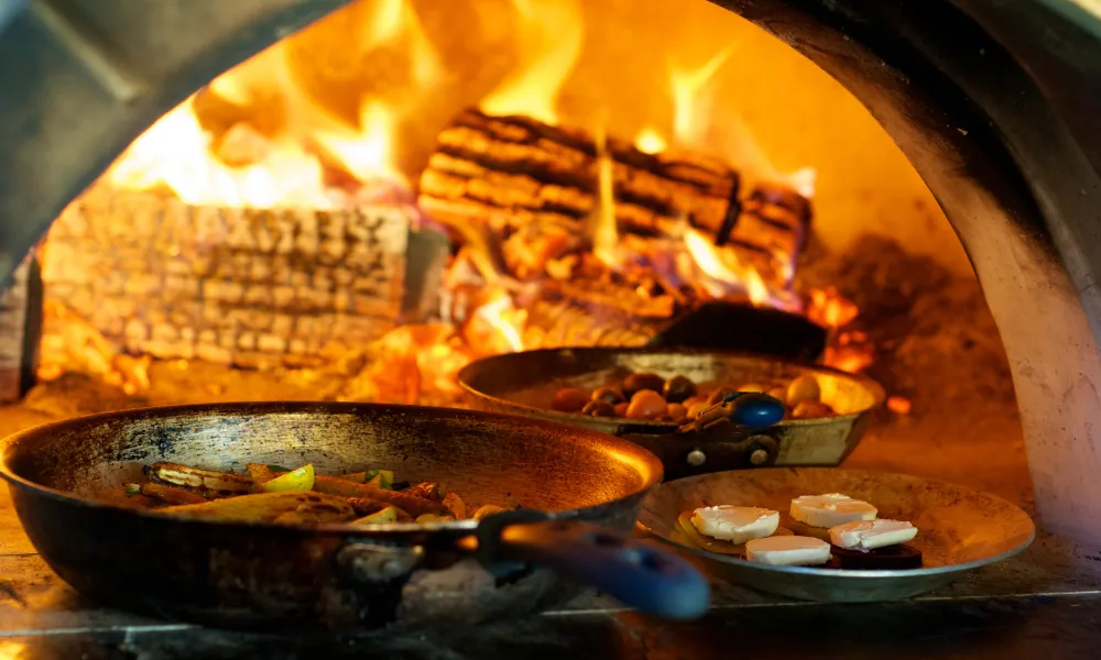 Chef's Garden meals cooking in the wood fired grill