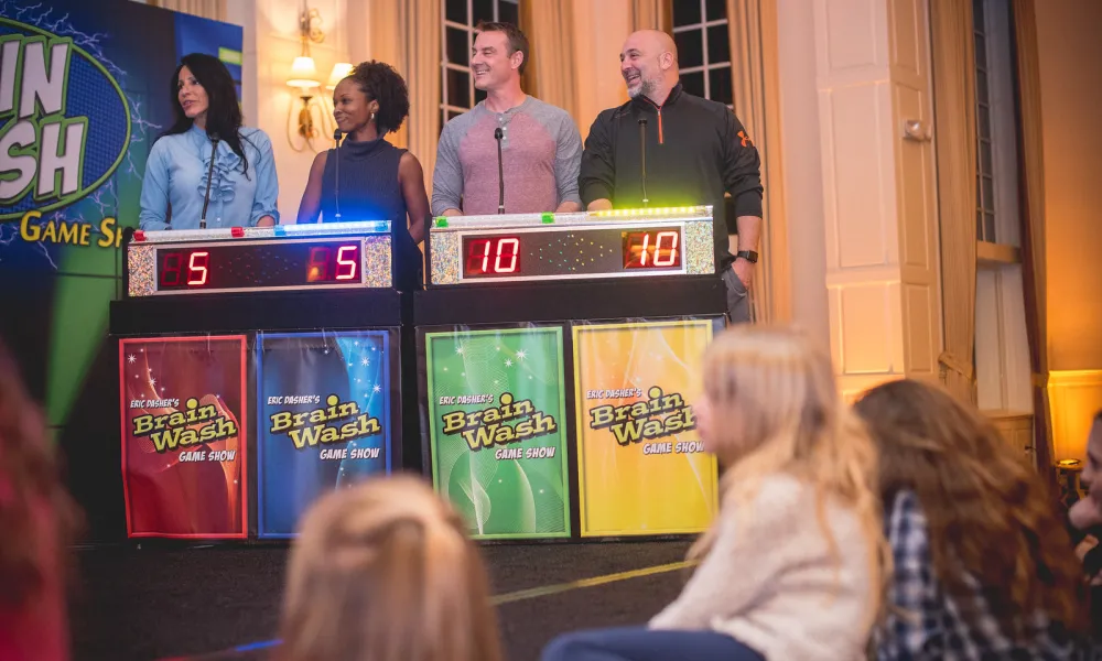 A group participating in an interactive game show