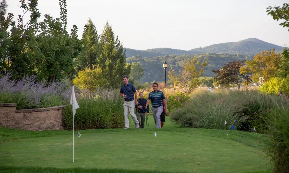 Corporate Group Playing Mini Golf at Grand Cascades Lodge