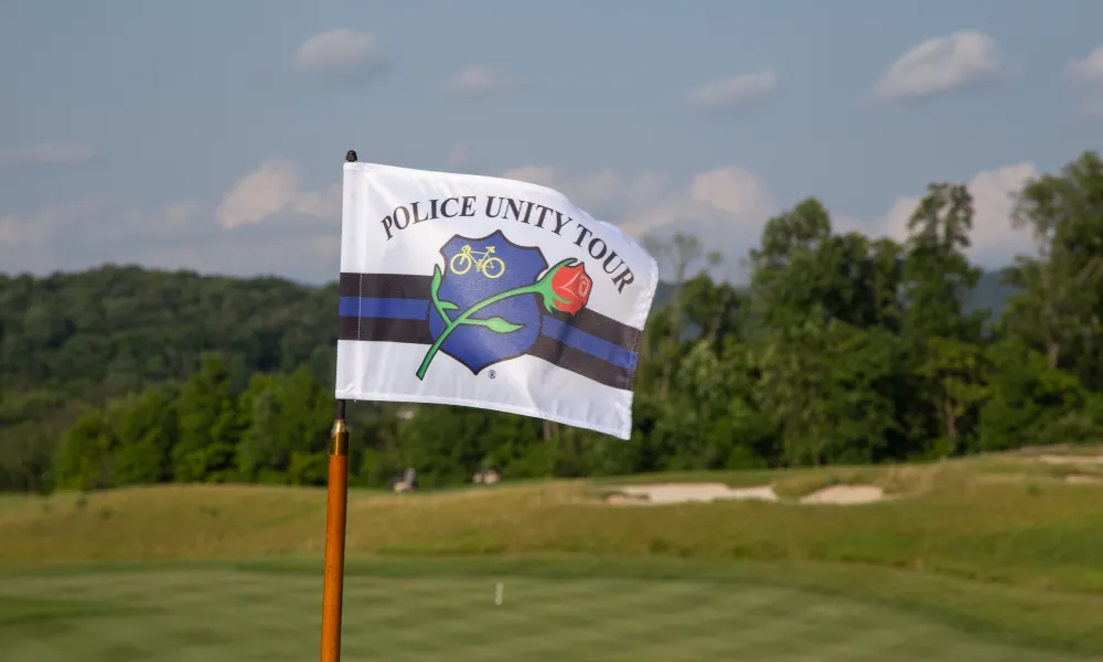 Police Unity Tour golf course flag