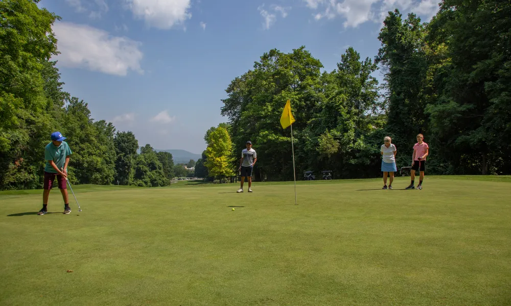 A family golfing at a family friendly resort near NYC