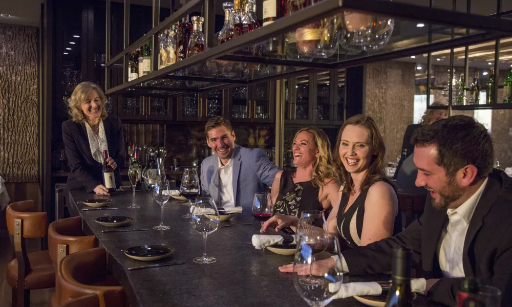 Group of friends enjoying dinner at Restaurant Latour.