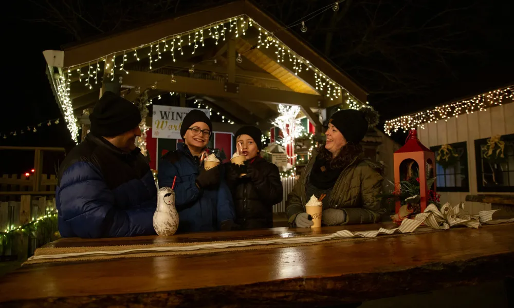 People enjoying festive cocktails at Frosty's Cantina