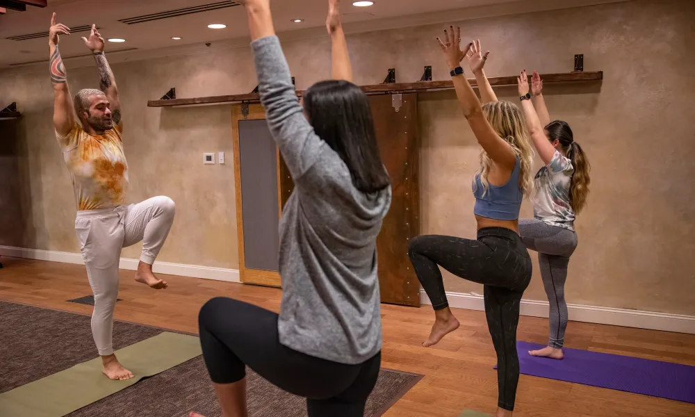 Girlfriends taking part in a yoga class at Crystal Springs Resort