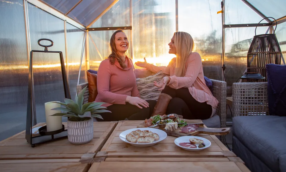 Girlfriends talking in Champagne Chalets 