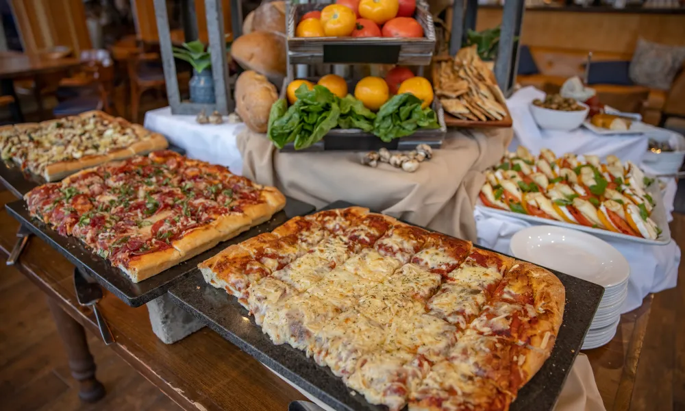 Pizza station buffet at cocktail hour