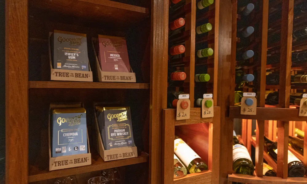 Wine books and bottle racks at The Curator