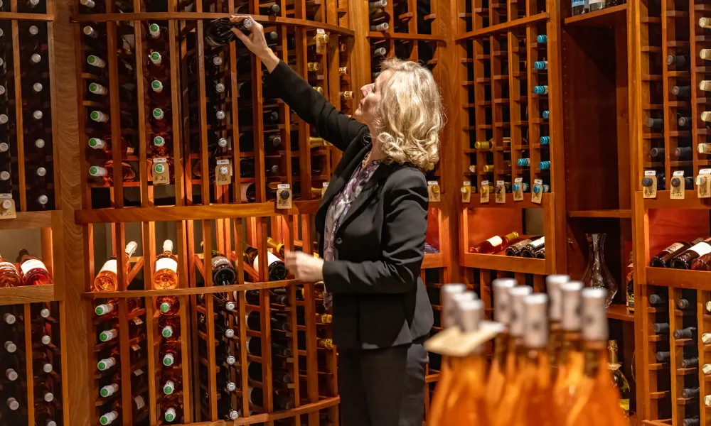 Sommelier picking wine at The Curator at Crystal Springs Resort in NJ