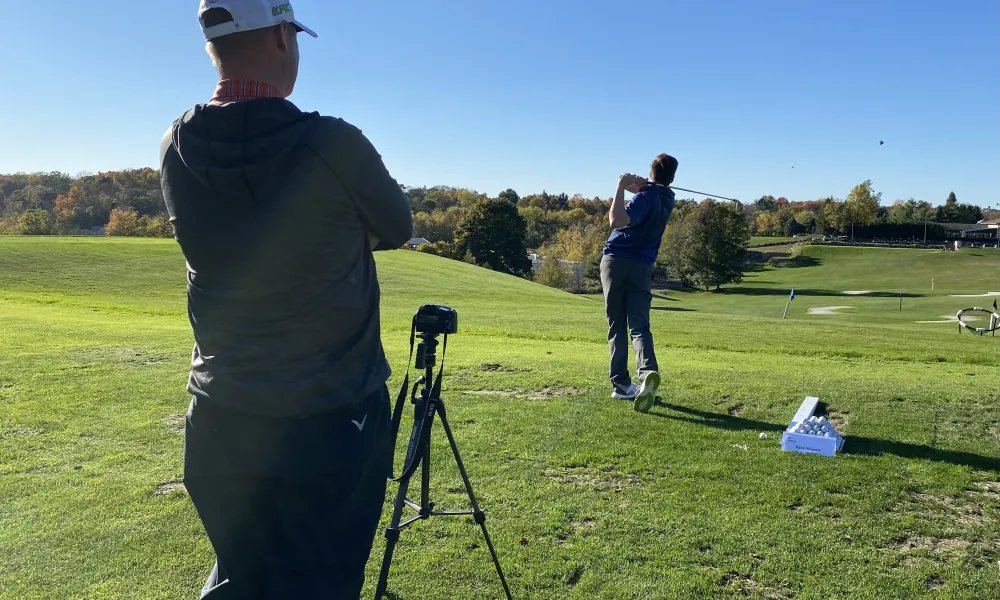 Golf Instructor teaching how to golf