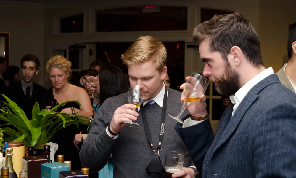 Men nosing wine at NJ Wine and Food Festival