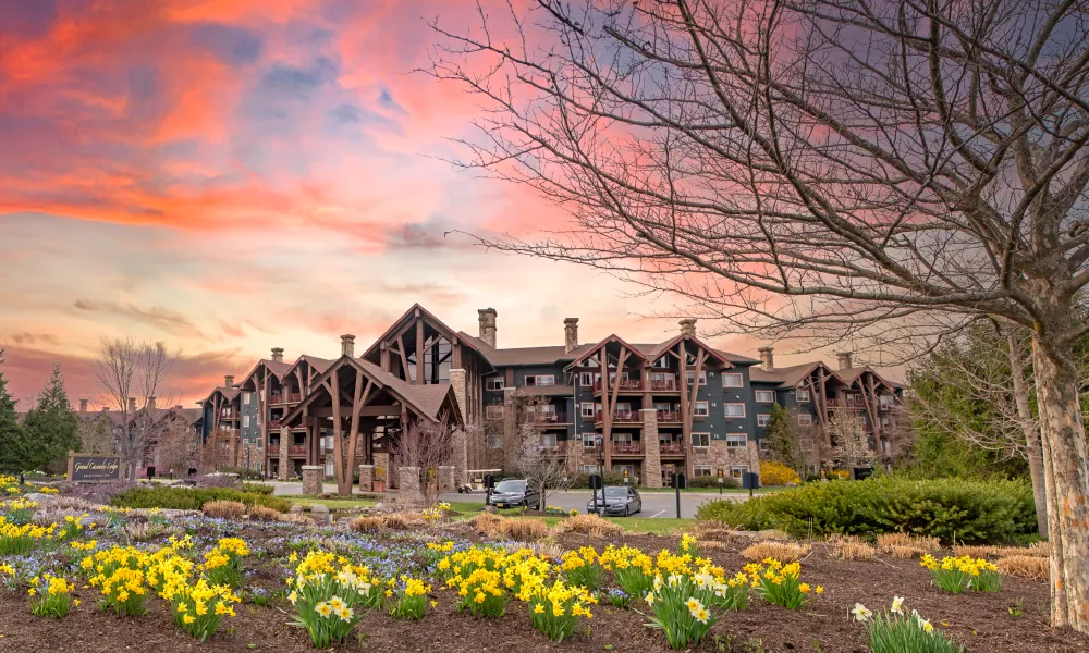 Grand Cascades Lodge exterior with beautiful sunset