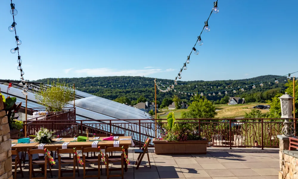 An event set up on the terrace overlooking a view from Crystal Springs Resort